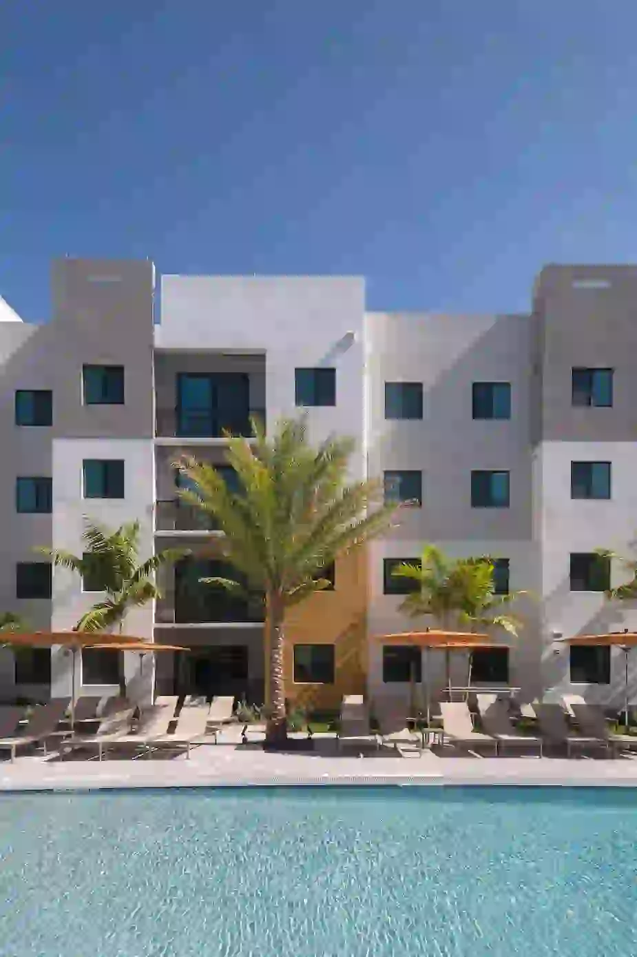 Pool and lounge chairs in courtyard