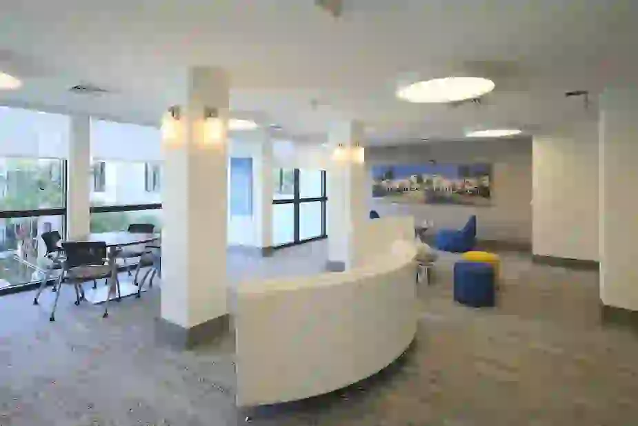 Study lounge area with group tables and sofas